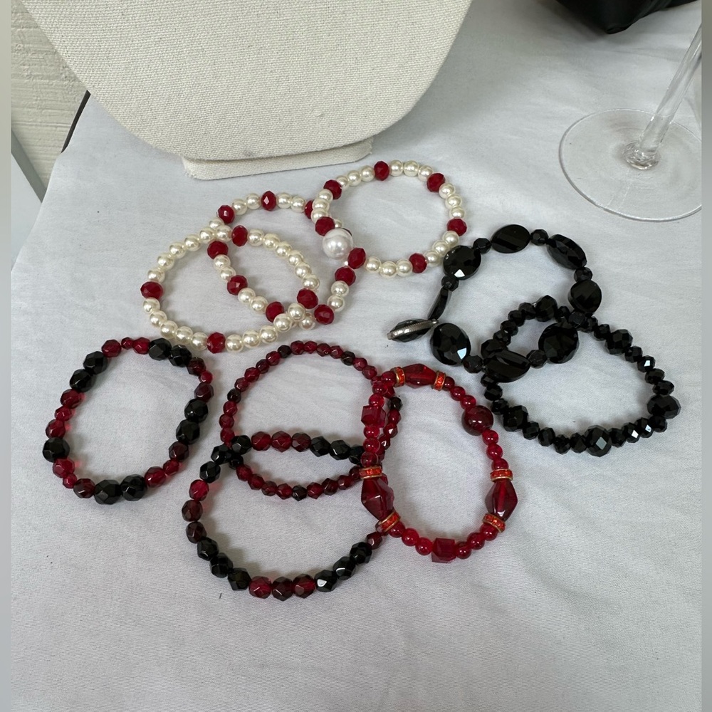 Set of 9 black red and pearl glass bead stretch bracelets